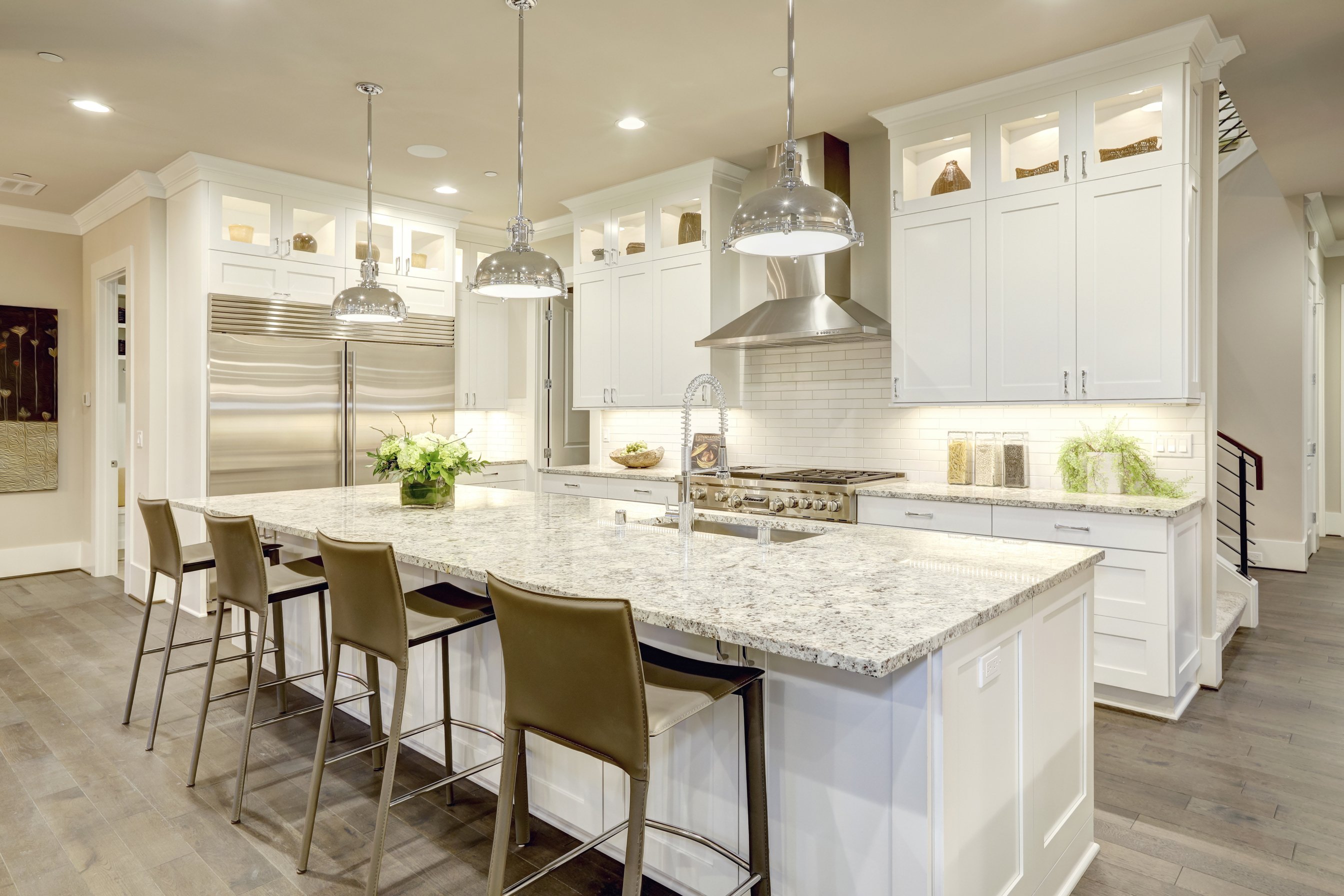 White kitchen design in new luxurious home